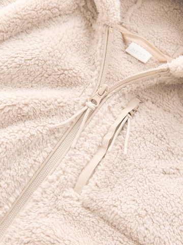 Jachetă  fleece de la Next pe bej