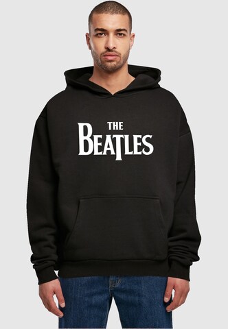 Merchcode Sweatshirt 'Beatles - Headline' in Schwarz: predná strana