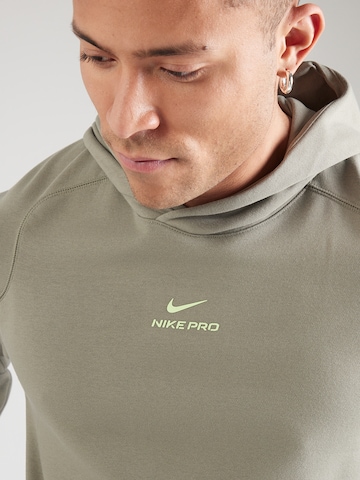 NIKE - Camiseta deportiva 'NPT' en verde