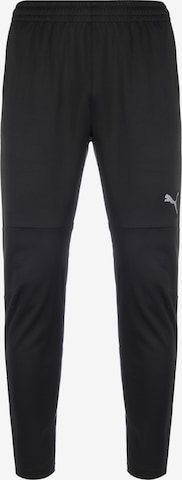 PUMA Slim fit Workout Pants in Black: front