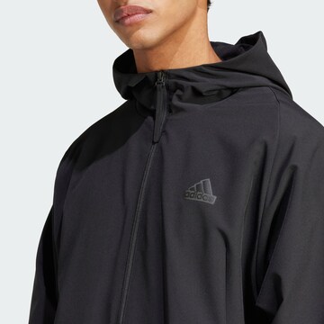 Veste de survêtement ADIDAS SPORTSWEAR en noir