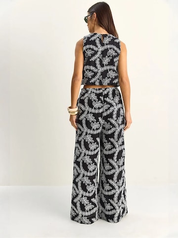 Pantalons de tailleur Bianco Lucci en noir
