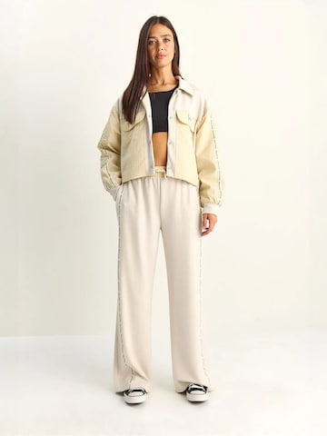 Pantalons de tailleur Bianco Lucci en beige : devant