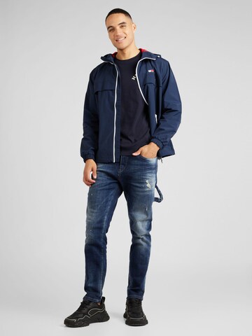 Tommy Jeans Tussenjas 'CHICAGO' in Blauw