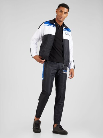 Sergio Tacchini Joggingová súprava 'TEXT' - Čierna