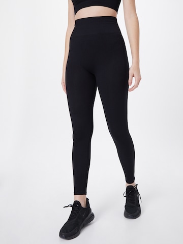 ABOUT YOU - Skinny Calças de desporto 'Kate' em preto: frente