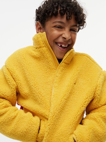 TOMMY HILFIGER Fleece jas in Geel