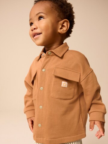 Set Next en marron