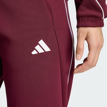 ADIDAS SPORTSWEAR Tapered Sports trousers 'Stadium' in Red