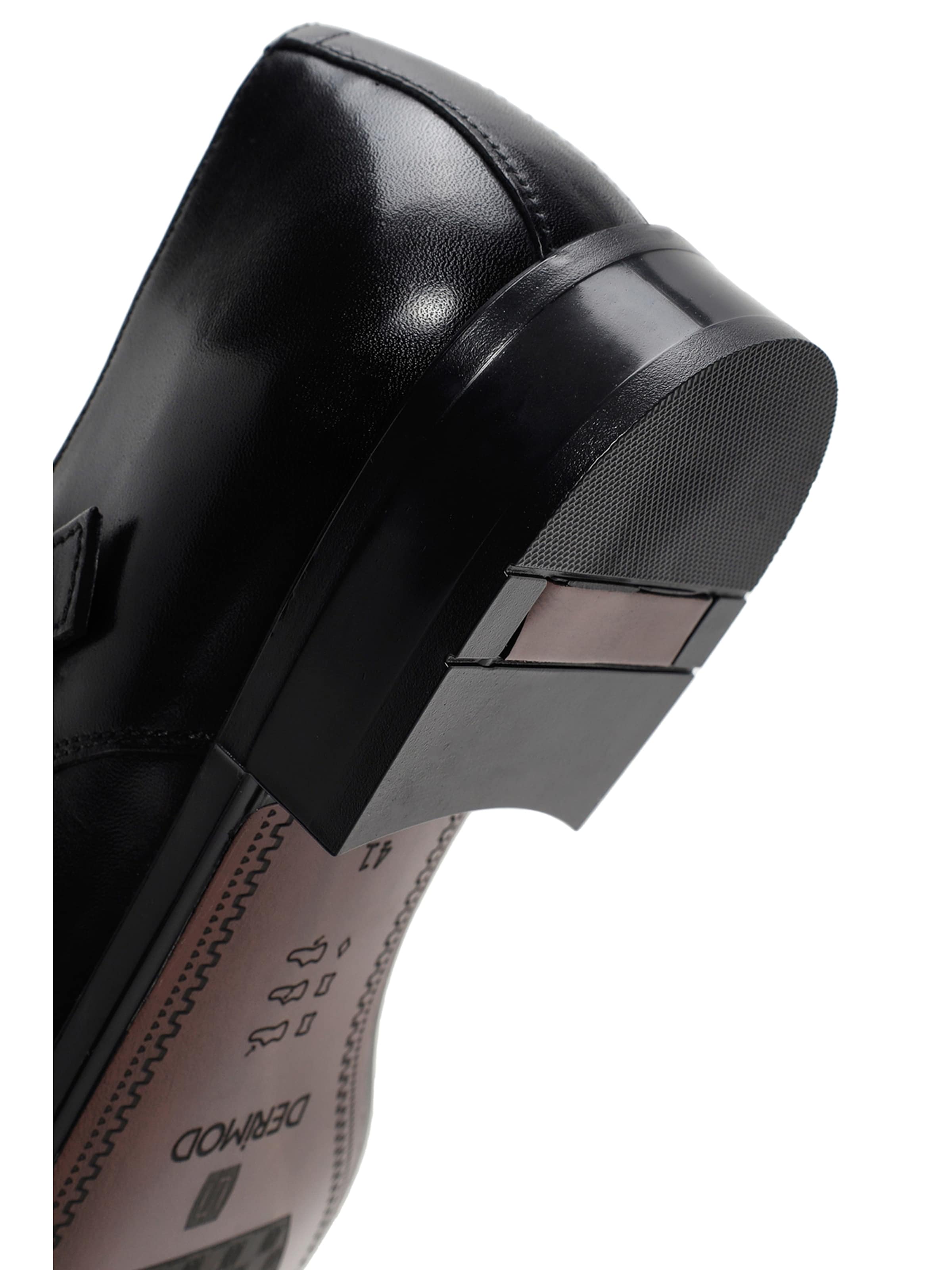 Slipper di Derimod in nero