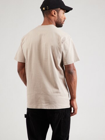 Tricou 'Chase' de la Carhartt WIP pe gri