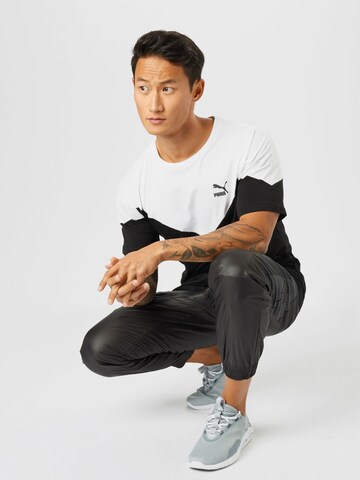 juoda PUMA Sportiniai marškinėliai 'Iconic MCS'