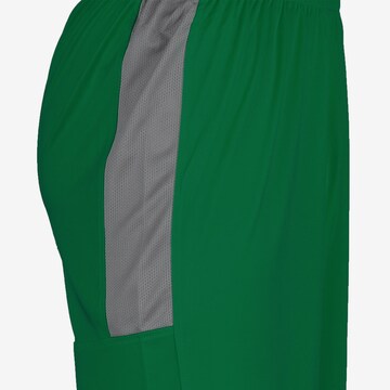 Loosefit Pantalon de sport PUMA en vert