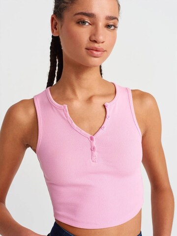 Haut Dilvin en rose