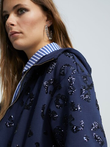 Lola Casademunt - Sudadera con cremallera en azul