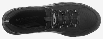 Chaussure de sport à lacets SKECHERS en noir