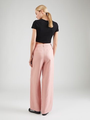 minimum Szeroka nogawka Spodnie w kolorze różowy