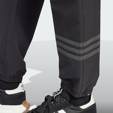 ADIDAS ORIGINALS Zwężany krój Spodnie w kolorze czarny