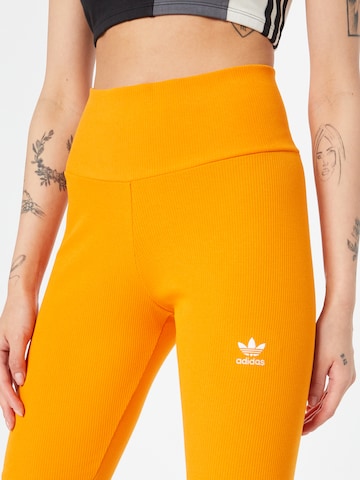 ADIDAS ORIGINALS Skinny Leggingsit värissä oranssi