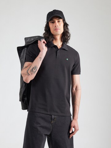 T-Shirt Calvin Klein Jeans en noir : devant