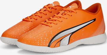 Chaussure de foot PUMA en orange