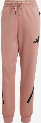 ADIDAS SPORTSWEARTapered Hlače 'Z.N.E.' - roza boja: prednji dio
