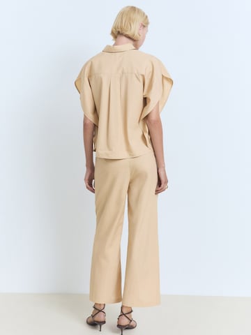 MANGO Bootcut Hlače 'TOMY-H' | rjava barva