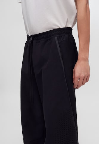 juoda Nike Sportswear Plačios klešnės Kelnės