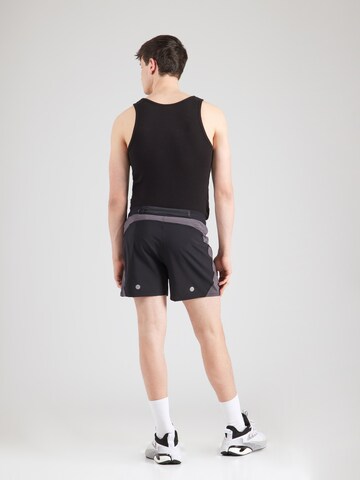ASICS Regular Urheiluhousut 'ROAD' värissä musta