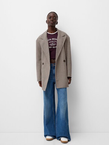 Bershka Övergångskappa i beige