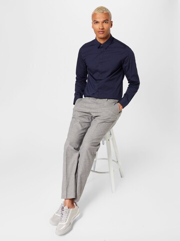 TOMMY HILFIGER - regular Pantalón de pinzas 'Denton' en gris