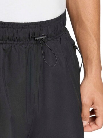 ADIDAS SPORTSWEAR Loosefit Παντελόνι φόρμας σε μαύρο