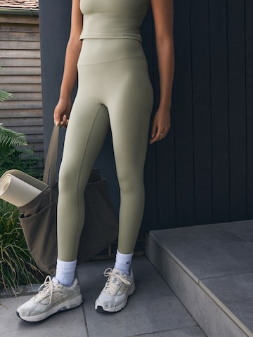 Skinny Leggings self. en vert : devant