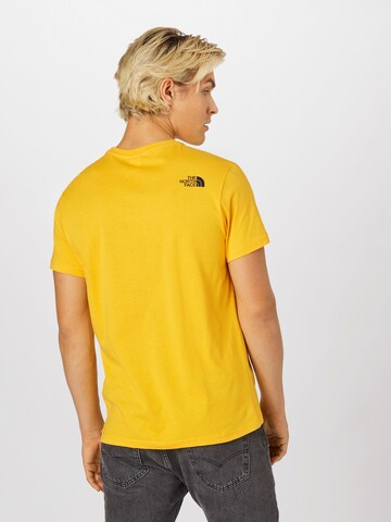THE NORTH FACE Regularny krój Koszulka 'Simple Dome' w kolorze żółty