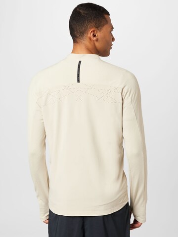 Veste de survêtement NIKE en beige