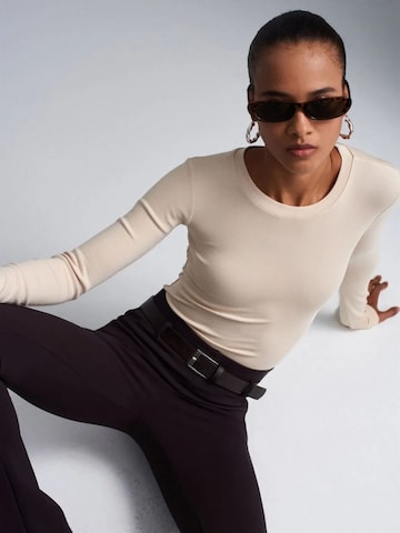 Dilvin Shirt bodysuit in Beige: front