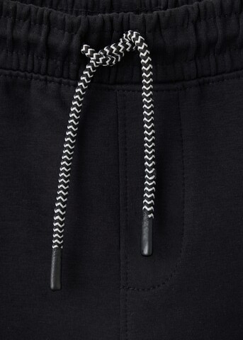 MANGO KIDS Tapered Byxa 'ZIPSET' i svart