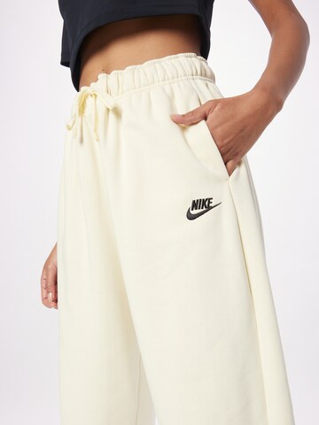 Nike Sportswear Ohlapna forma Hlače | bež barva