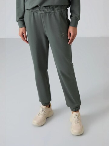 Tuta da jogging di Tommy Life in verde