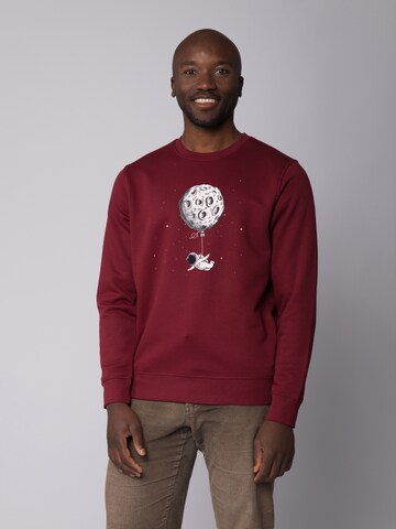 Watapparel Sweatshirt 'Funny Spaceman' in Red: front