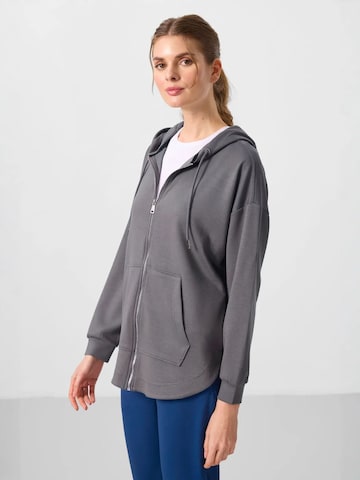 Sweat-shirt Tommy Life en gris
