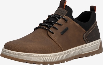 Chaussure à lacets Rieker en marron : devant