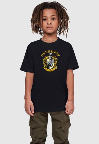 ABSOLUTE CULT Shirt 'Harry Potter - Hufflepuff Crest' in Zwart: voorkant