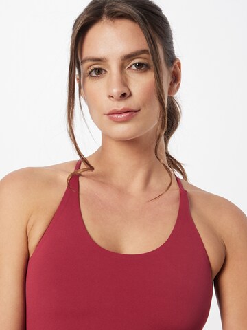 Girlfriend Collective - Soutien Bustier Soutien de desporto 'CLEO' em rosa