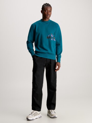 Sweat-shirt Calvin Klein Jeans en bleu