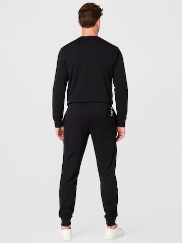 EA7 Emporio Armani Skinny Byxa 'Ea7' i svart