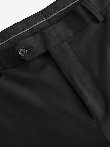 Next Дънки Tapered Leg Панталон с ръб 'Motionflex' в черно