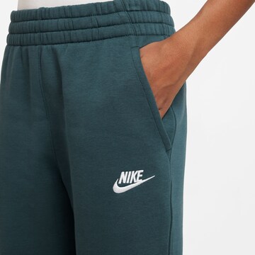 Nike Sportswear Tapered Sporthose in Blau