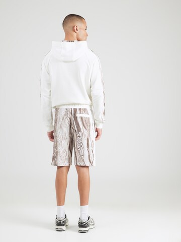 Carlo Colucci tavaline Püksid, värv pruun: tagant vaates