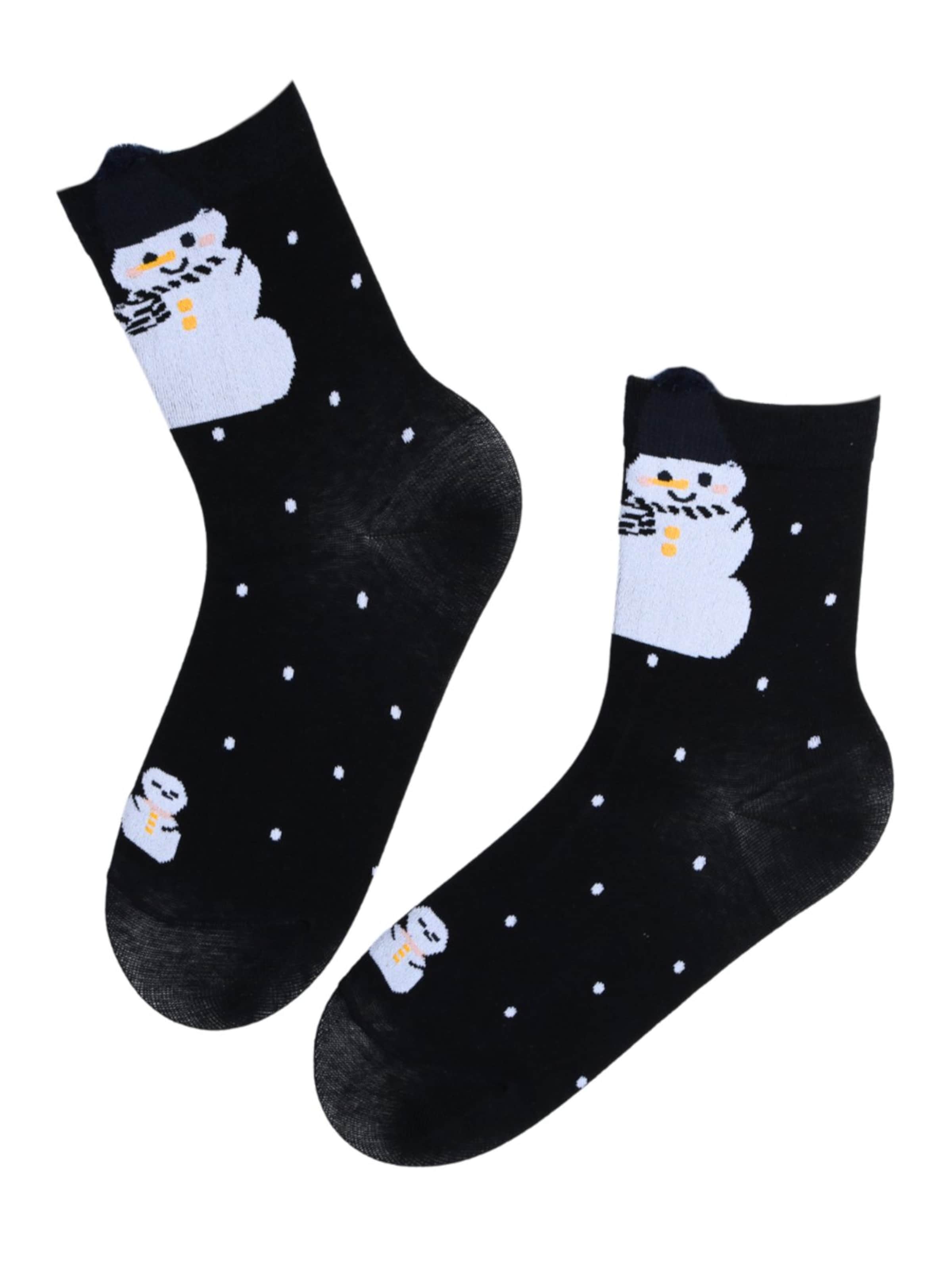 Sokisahtel - Calcetines 'OLWEN cotton Christmas socks with a snowman' en negro
